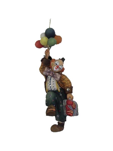 Clown hängend mit Luftballon Clown hängend mit Luftballon