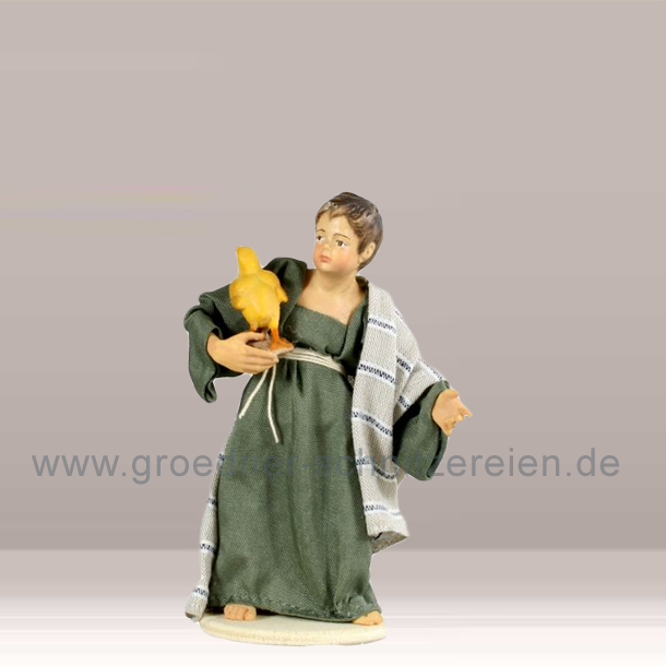 Junge mit Kuken orient. Junge mit Kuken orient.