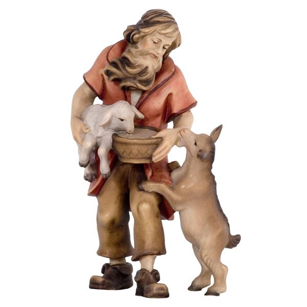 Hirt stehend mit Schaf und Ziege Hirt stehend mit Schaf und Ziege