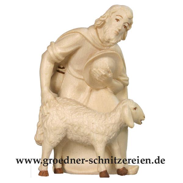 Hirt gebogen mit Schaf