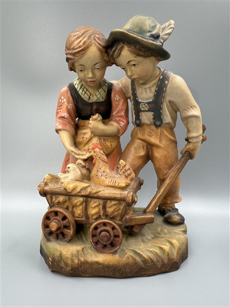 Kindergruppe mit Leiterwagen