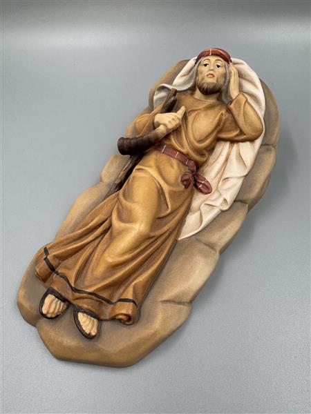 Hirt liegend mit Horn