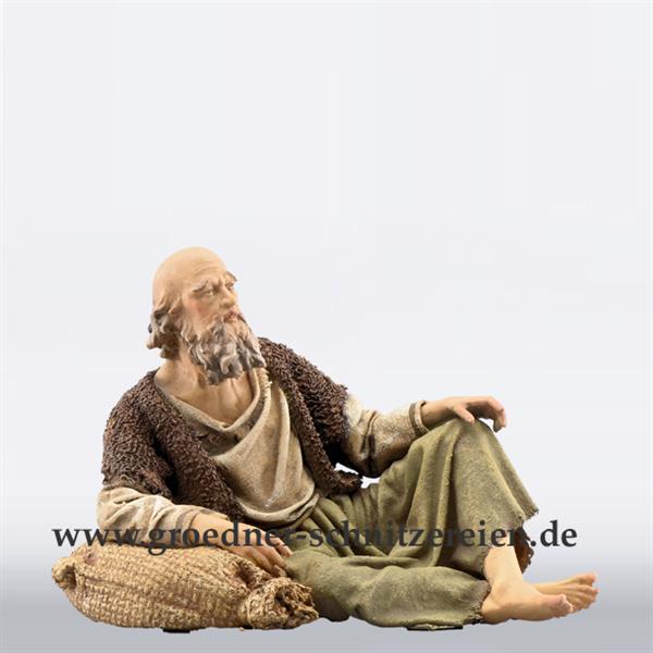Hirt sitzend Hirt sitzend