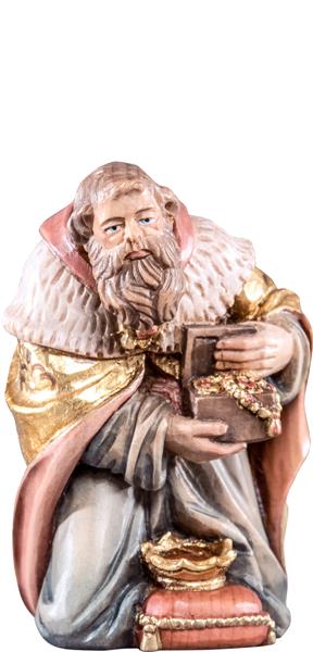 König Melchior kniend
