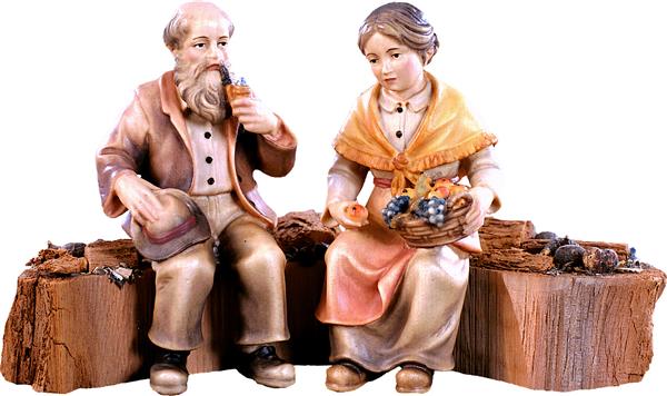 Opa und Oma auf Holzstamm Opa und Oma auf Holzstamm